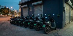 Electric delivery two-wheelers charging at a dark store, the hyperlocal delivery duty cycle in practice